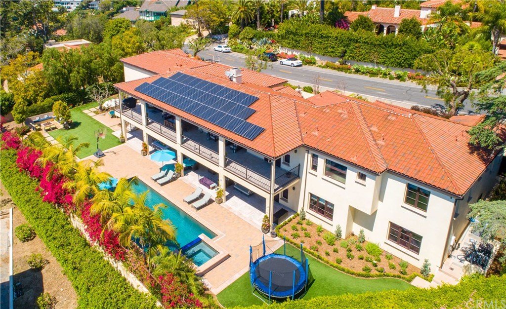 Aerial View Of 12791 Panorama Crest Showing Backyard With Pool And Solar Panels On The Roof.