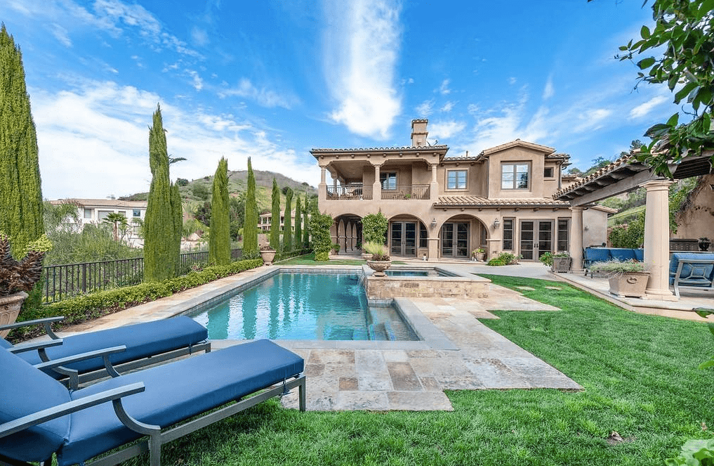 Backyard Of San Juan Capistrano Estate With Beautiful Pool And Outdoor Entertaining Spaces.
