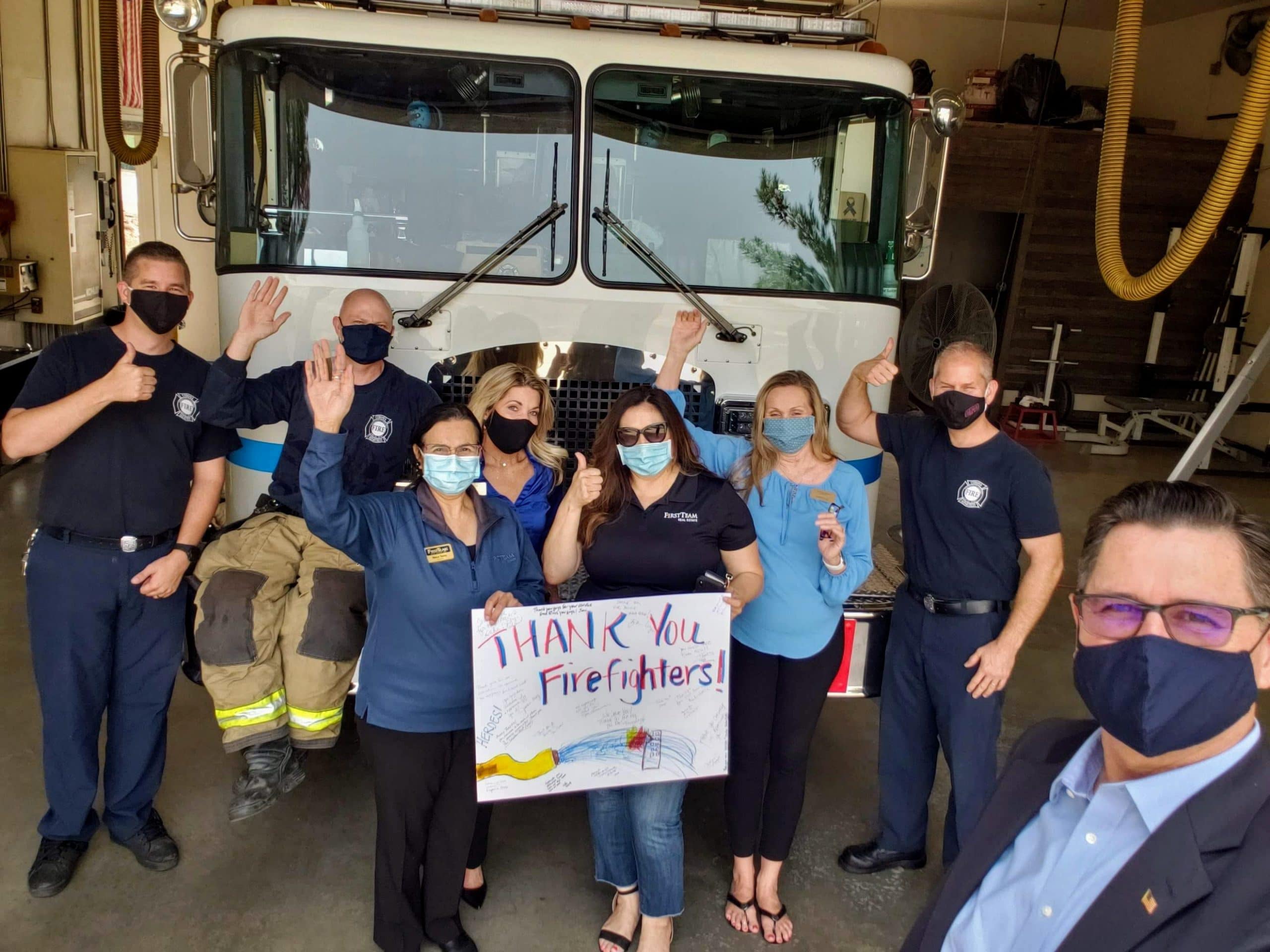 First Team Corona Real Estate Agents Wearing Face Masks And Visiting Corona Fire Department.
