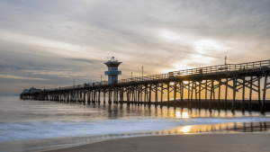 Seal Beach Pier And Ocean At Sunset