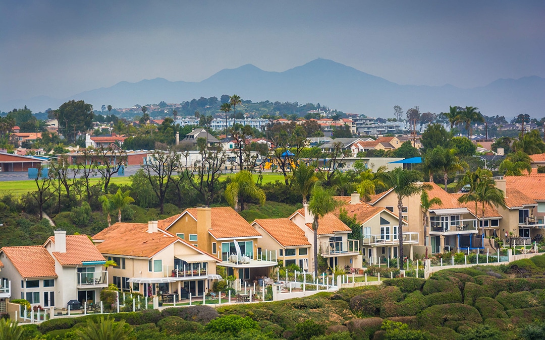 View of houses and distant mountains from Hilltop Park in Dana Point, California.