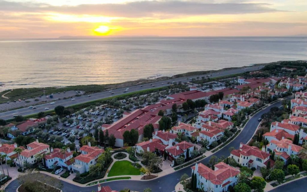 Crystal Cove Neighborhood Community In The Newport Coast Before Sunset. Luxury Big Villa With Pool On The Cove.